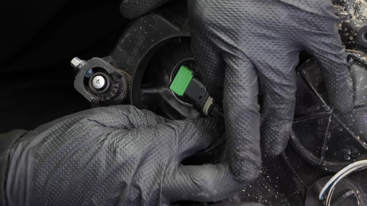 Replace the low beam bulb