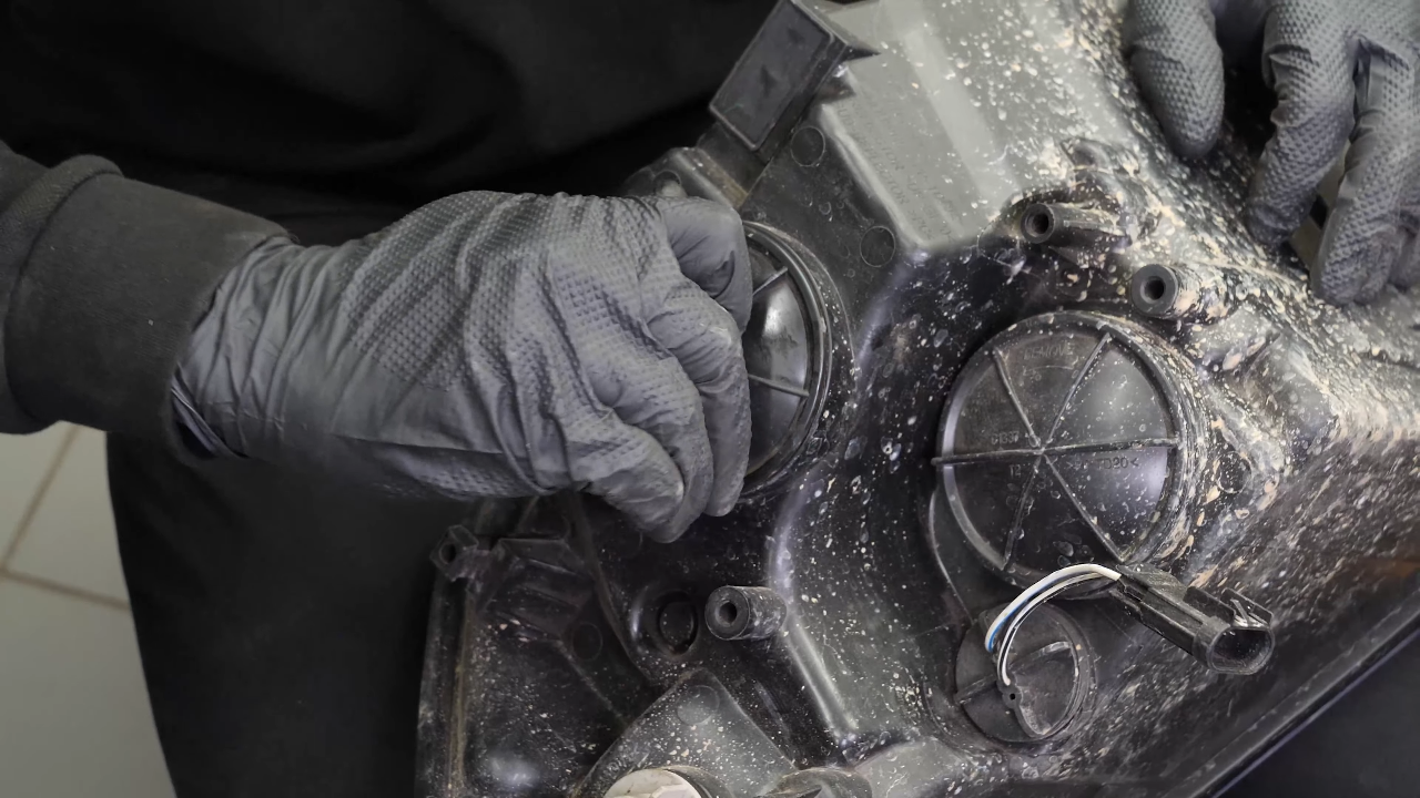 Replace the low beam bulb