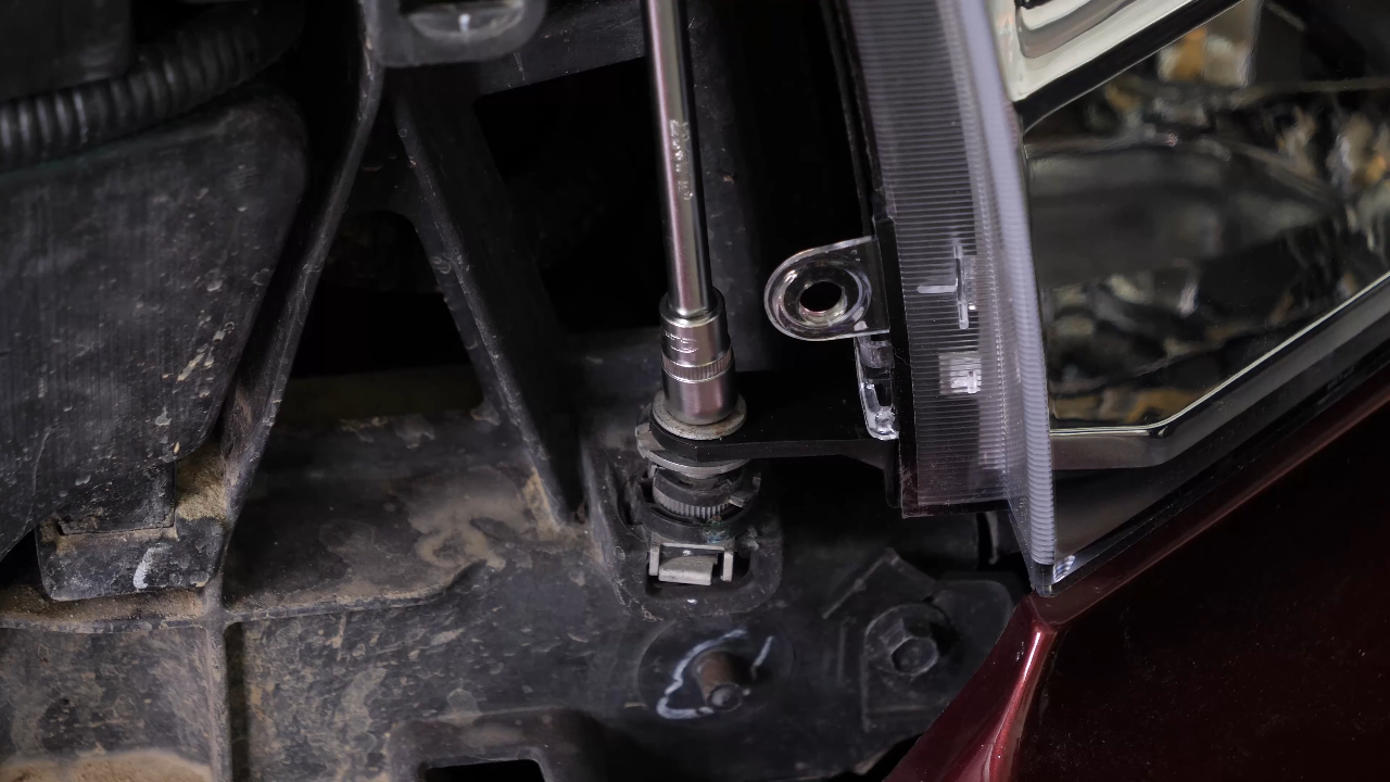 Put the headlight assembly back in