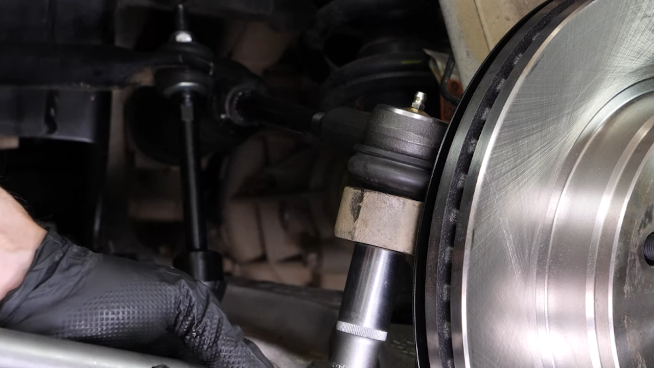 Install the new outer tie rod