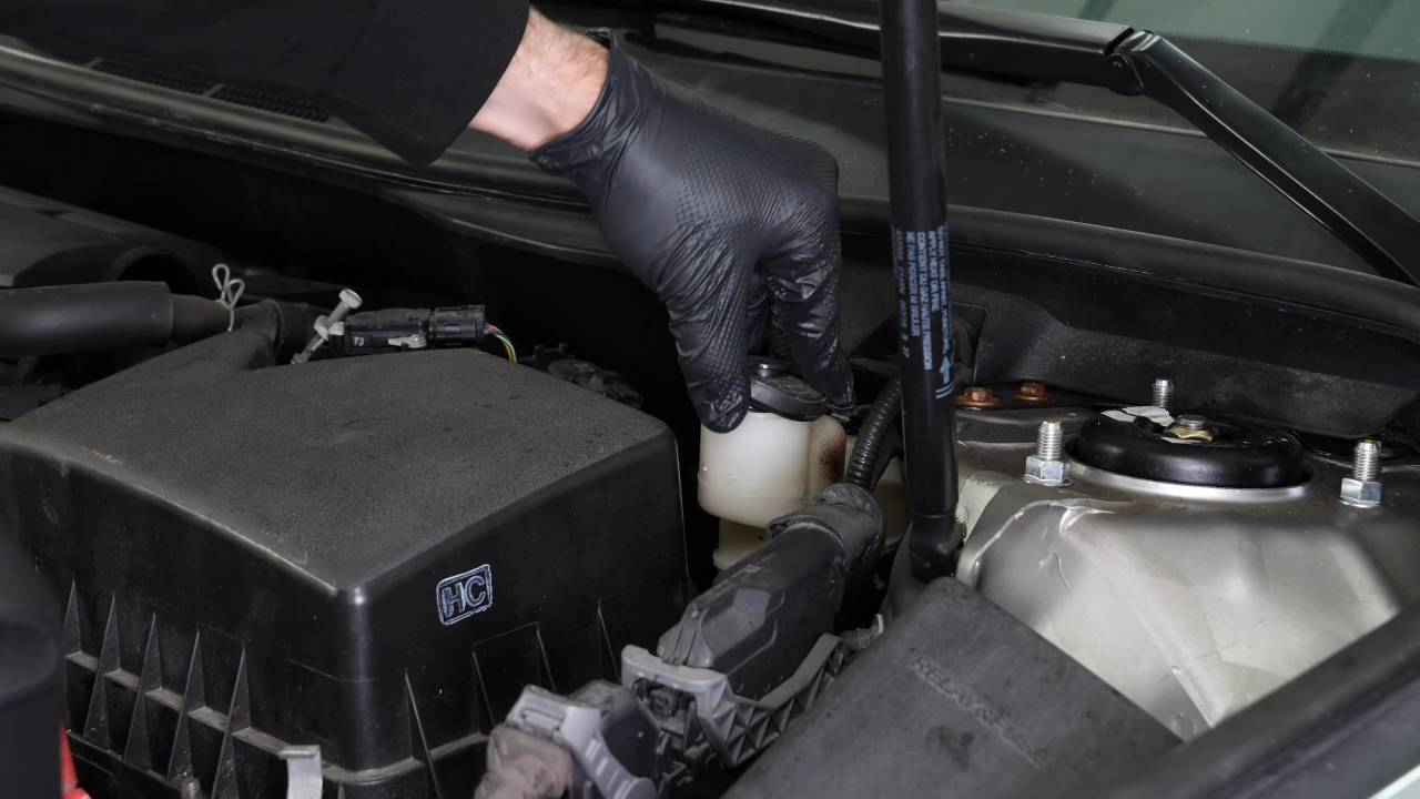 Open the brake fluid reservoir