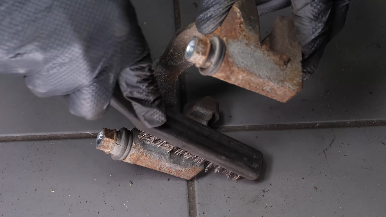 Put the brake caliper mount back on