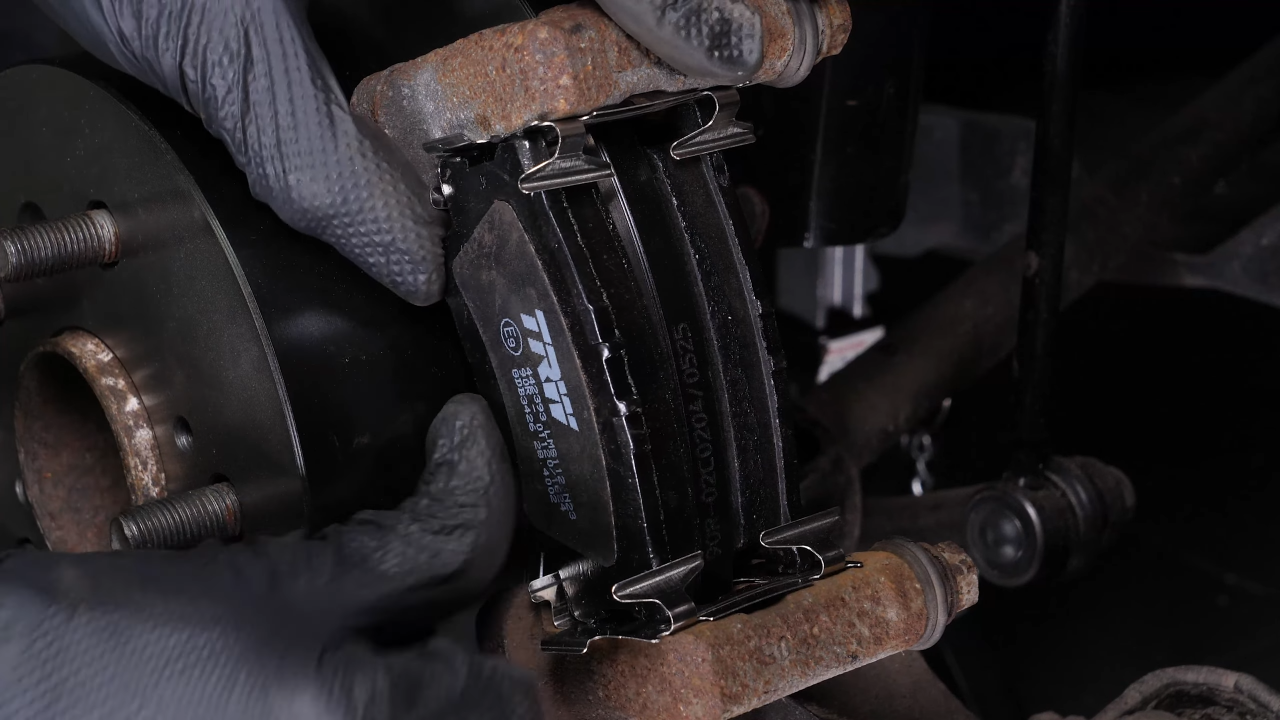 Place the new brake pads