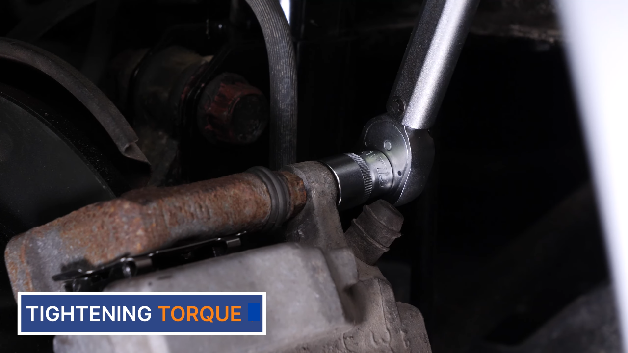 Put the brake caliper back
