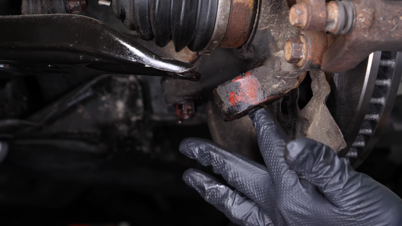Separate the ball joint from the control arm 