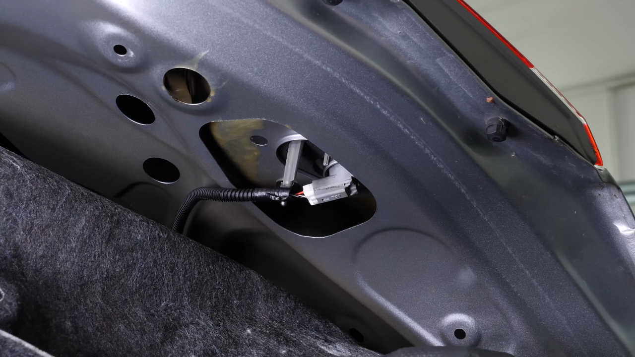 Replace the reverse light bulb
