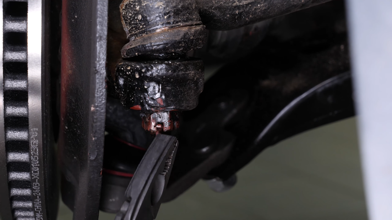 Remove the outer tie rod