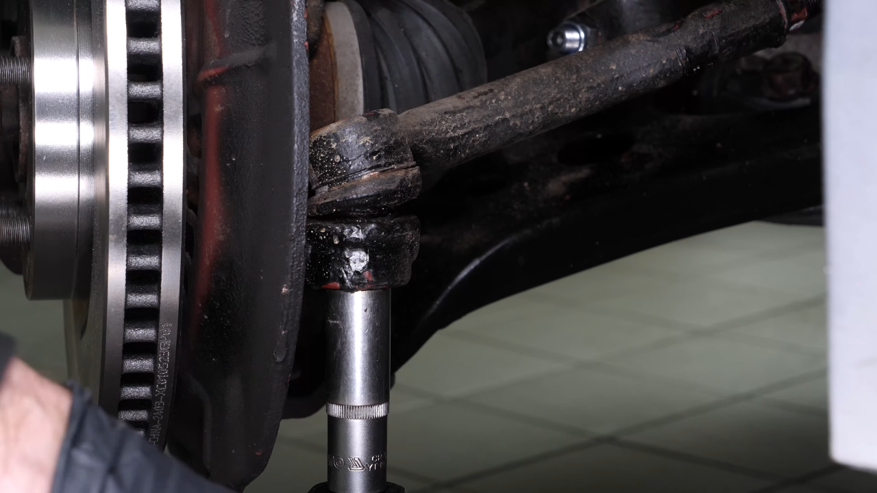 Remove the outer tie rod