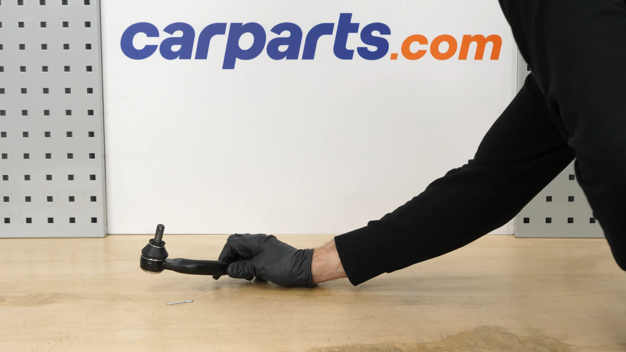 Put the outer tie rod back