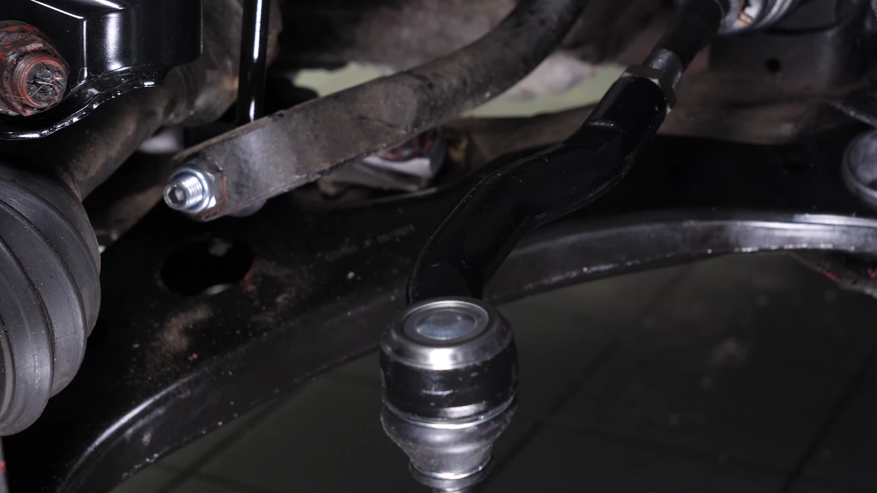 Put the outer tie rod back