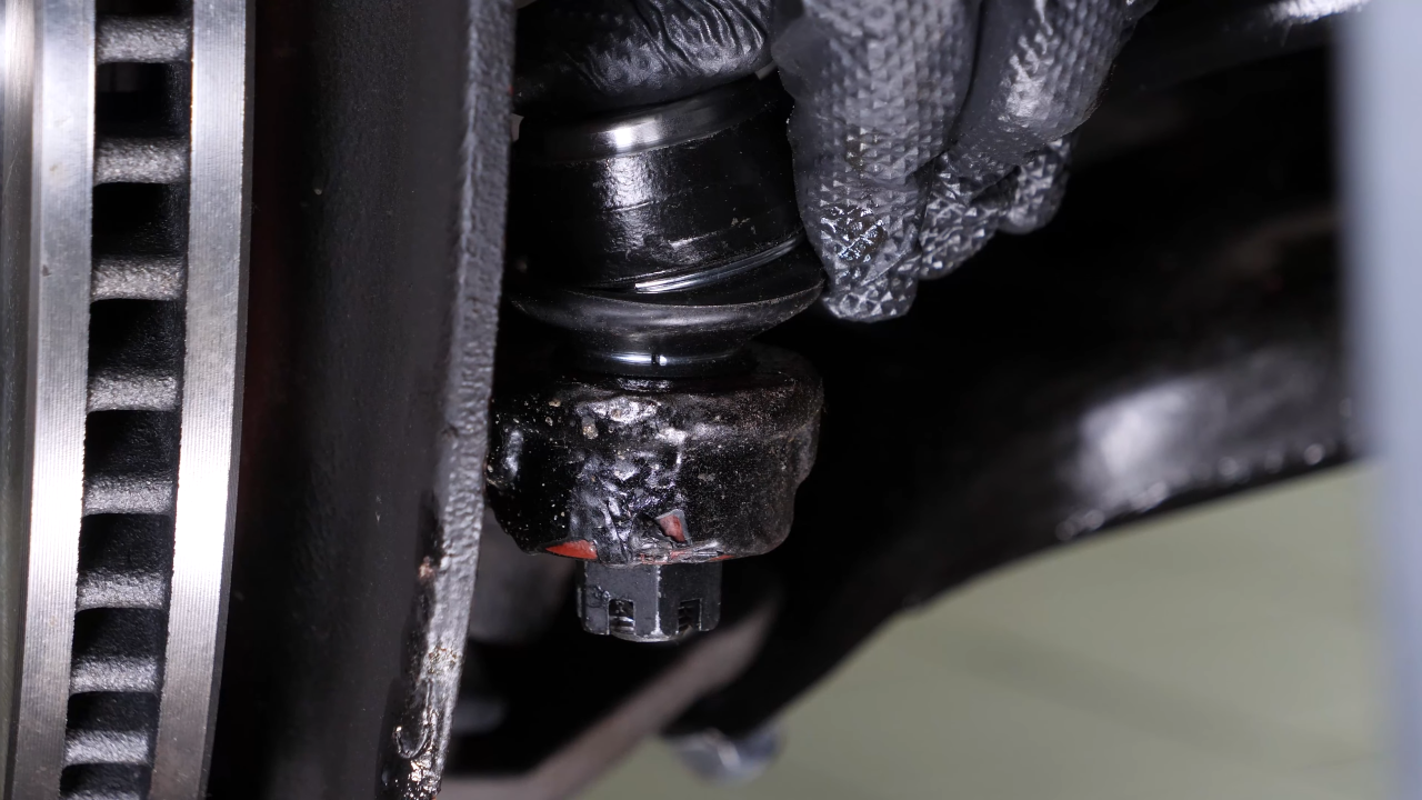 Put the outer tie rod back