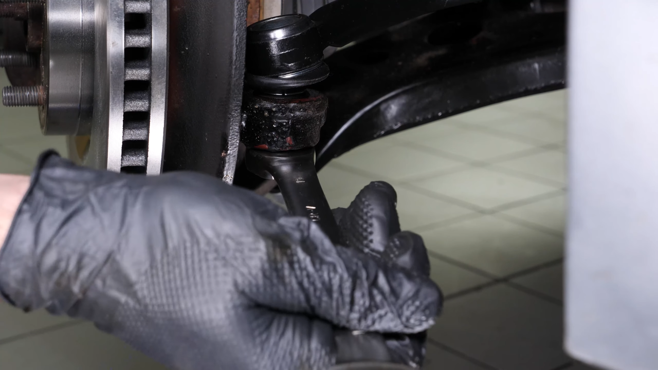 Put the outer tie rod back