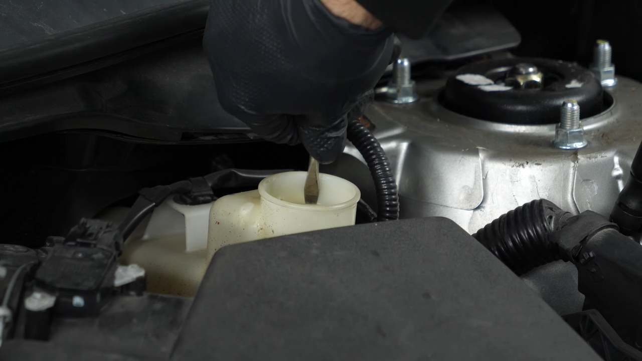 Open the brake fluid reservoir
