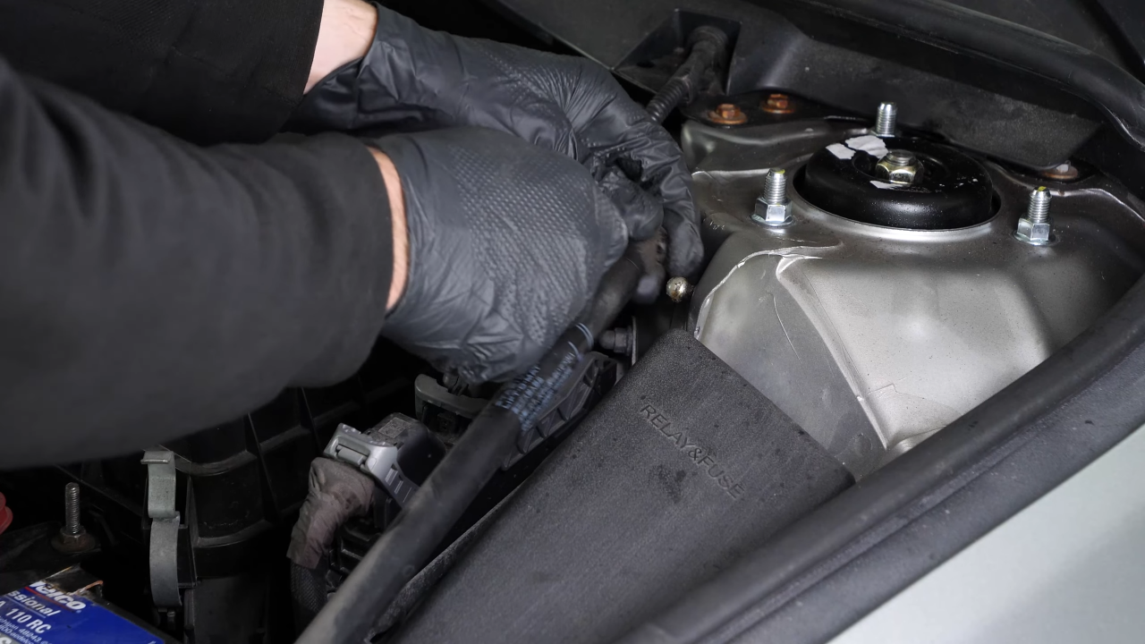 Remove the hood lift support