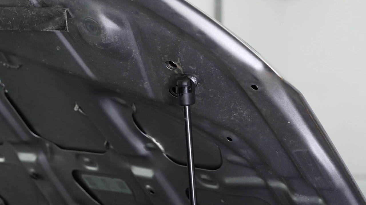 Install the new hood lift support