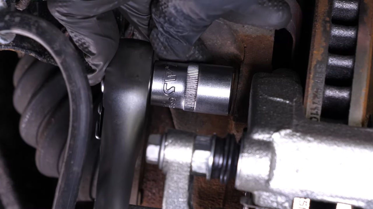 Remove the caliper assembly