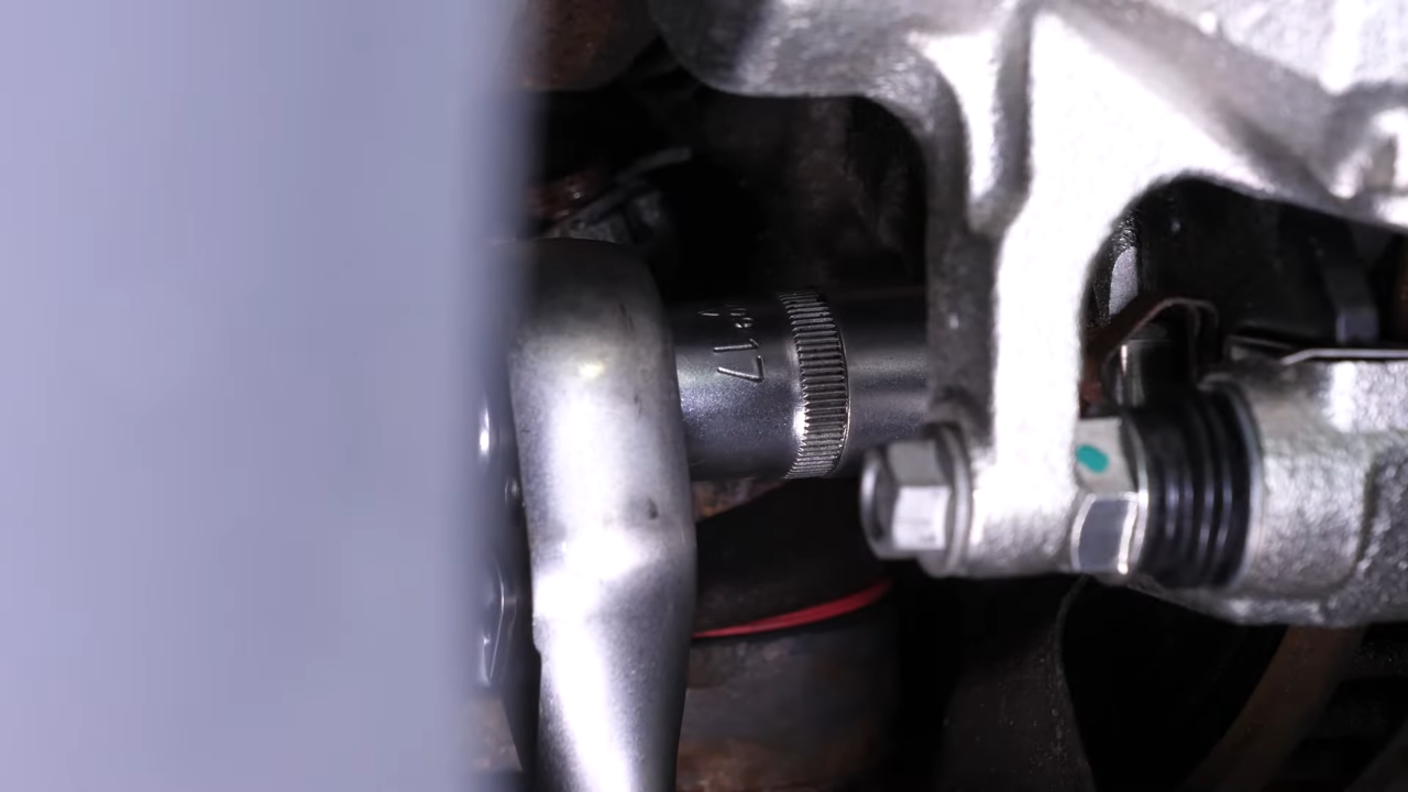 Remove the caliper assembly