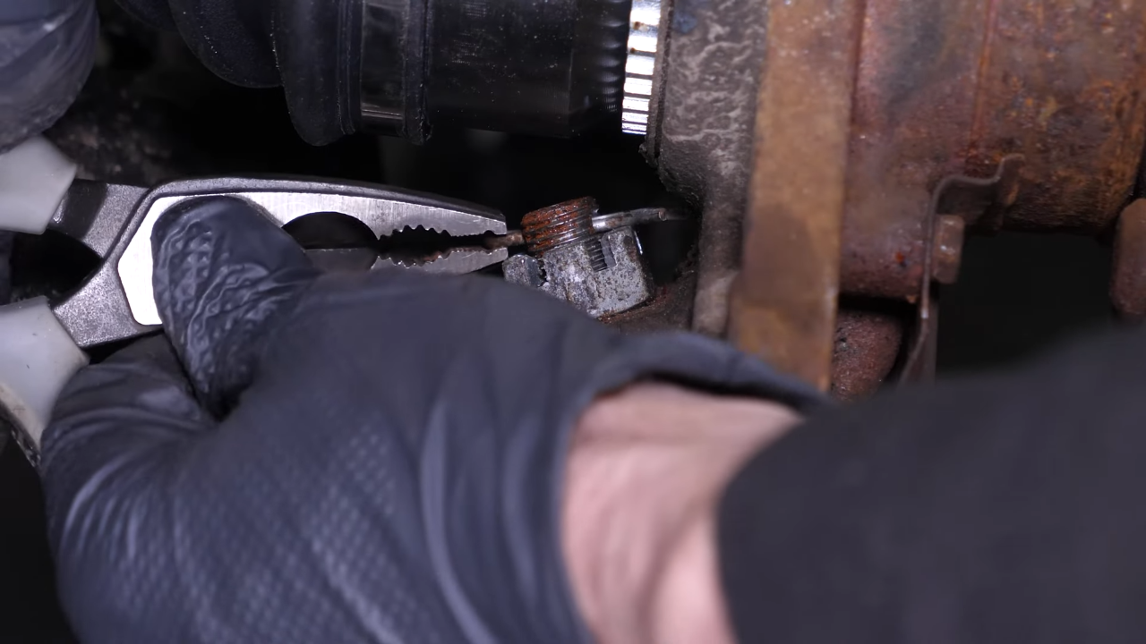 Remove the outer tie rod