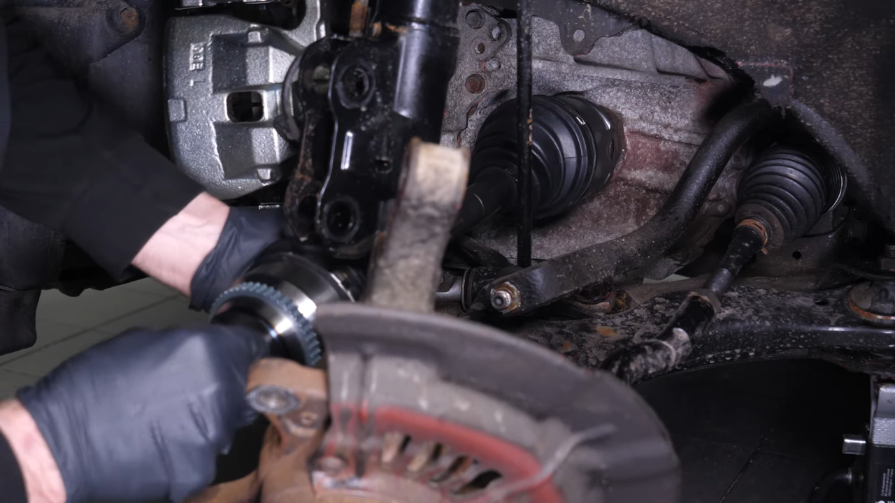 Put the CV axle back