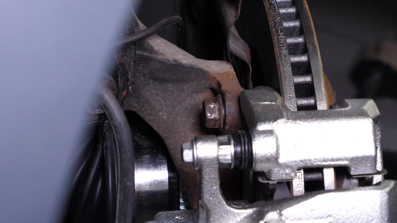 Put the caliper assembly back