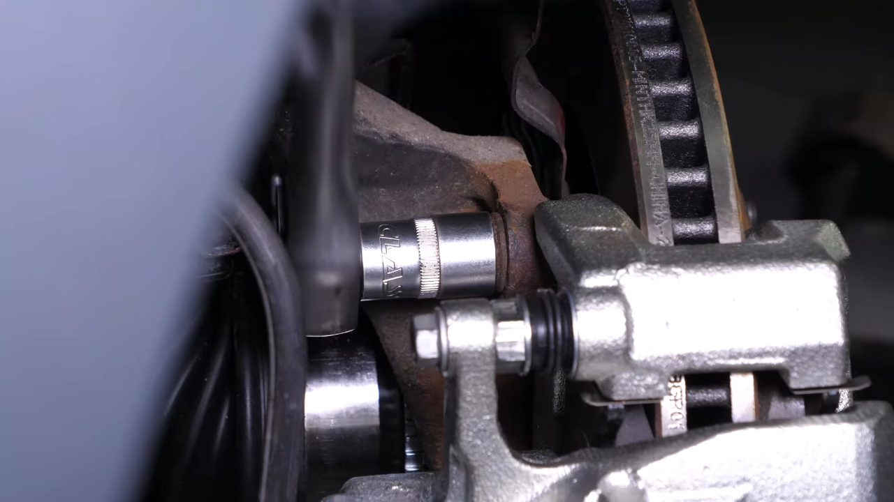Put the caliper assembly back