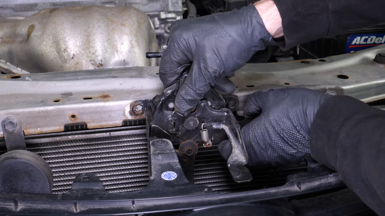 Remove the upper tie bar 