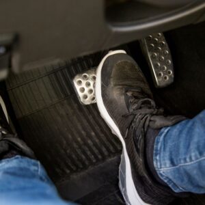 stepping on brake pedal