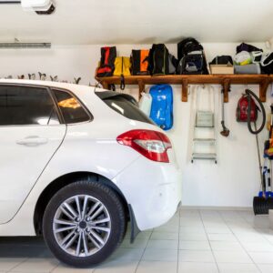 white sedan inside a garage
