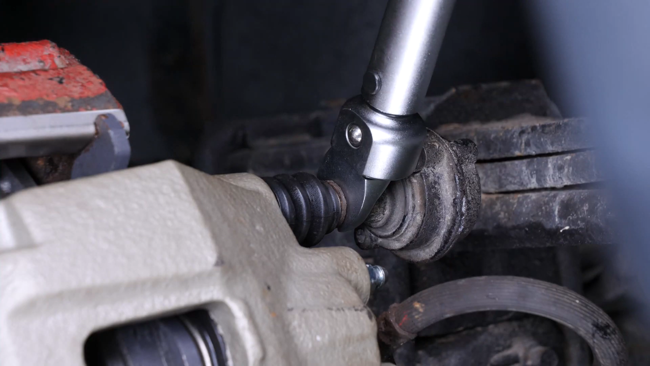 Put the brake caliper back