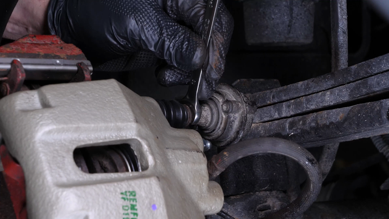 Remove the brake caliper