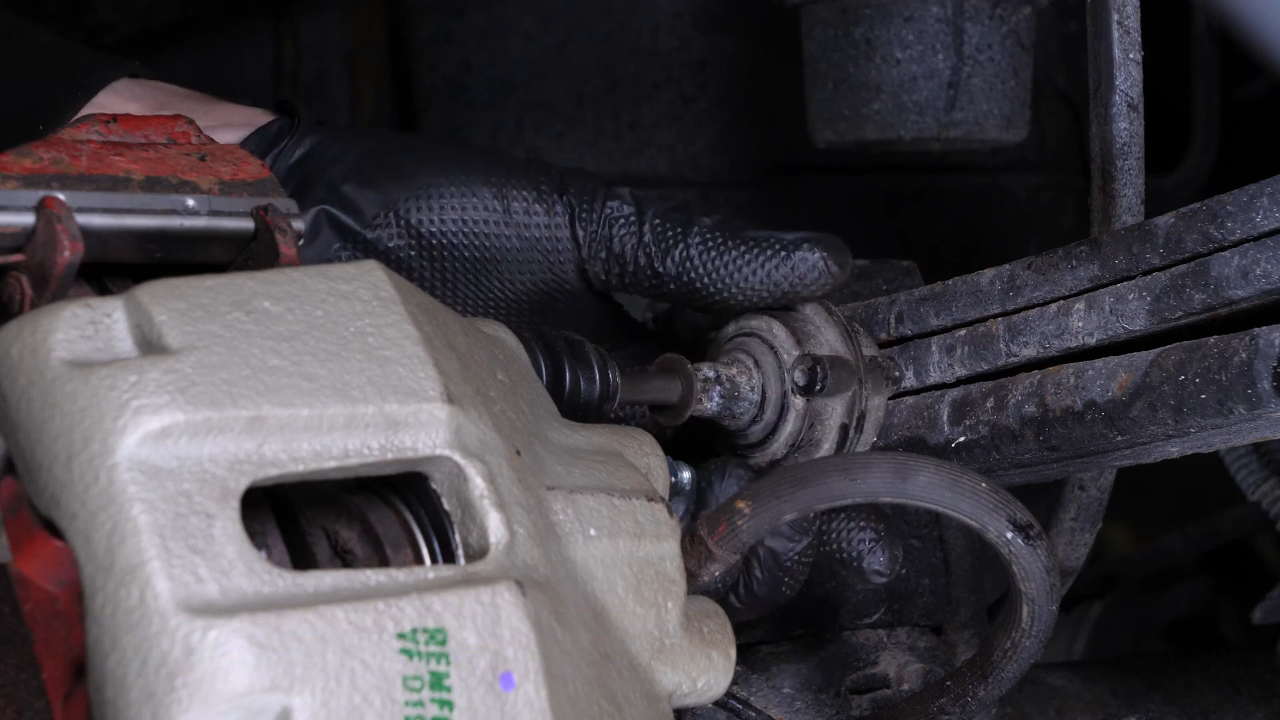 Remove the brake caliper