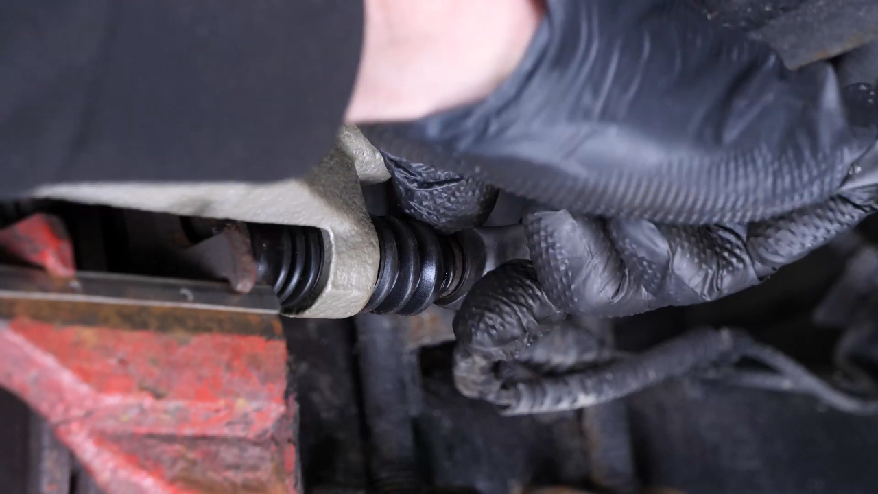 Remove the brake caliper