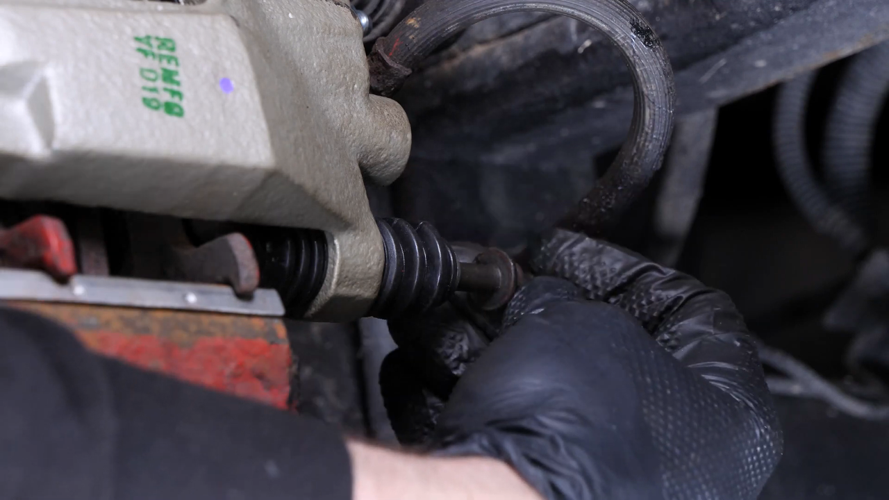 Remove the brake caliper