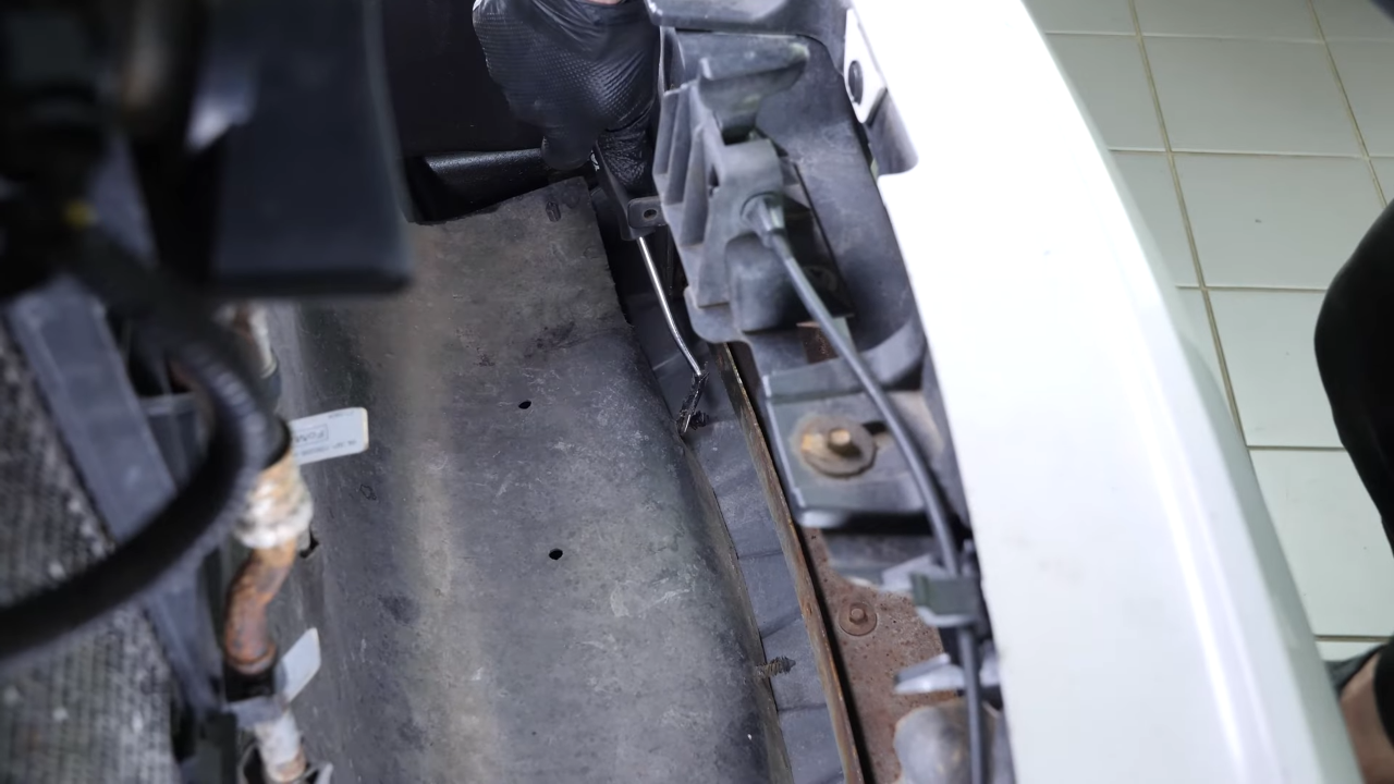 Remove the 3 bottom clips