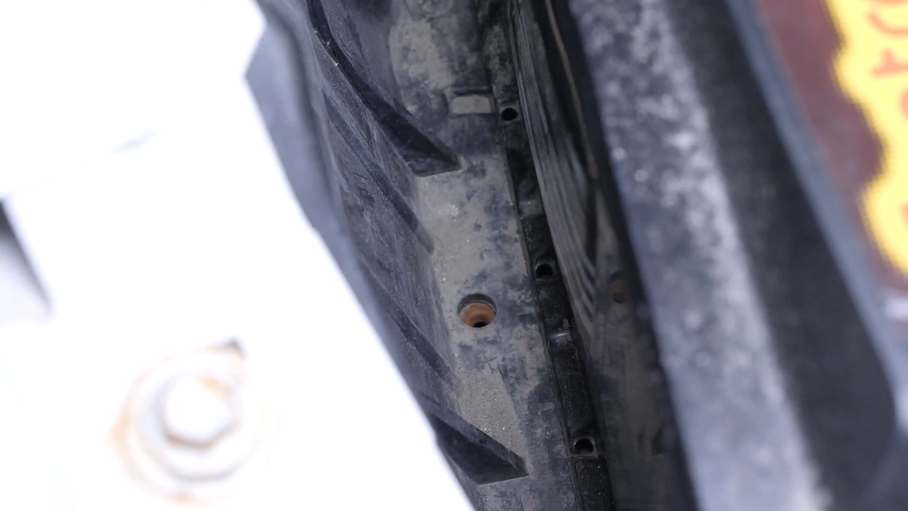 Remove the fastening clamp