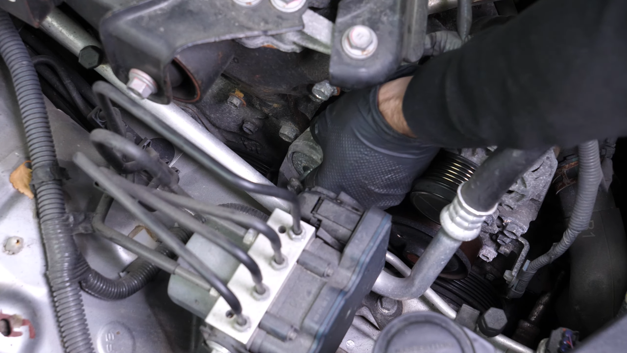 Remove the tensioner pulley