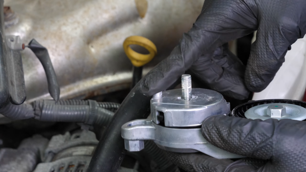 Install the new tensioner pulley