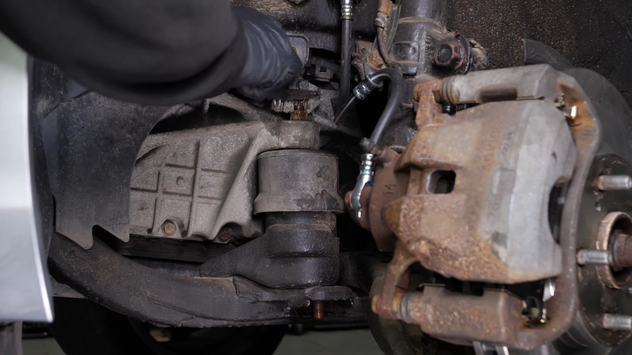 Remove the transmission mount