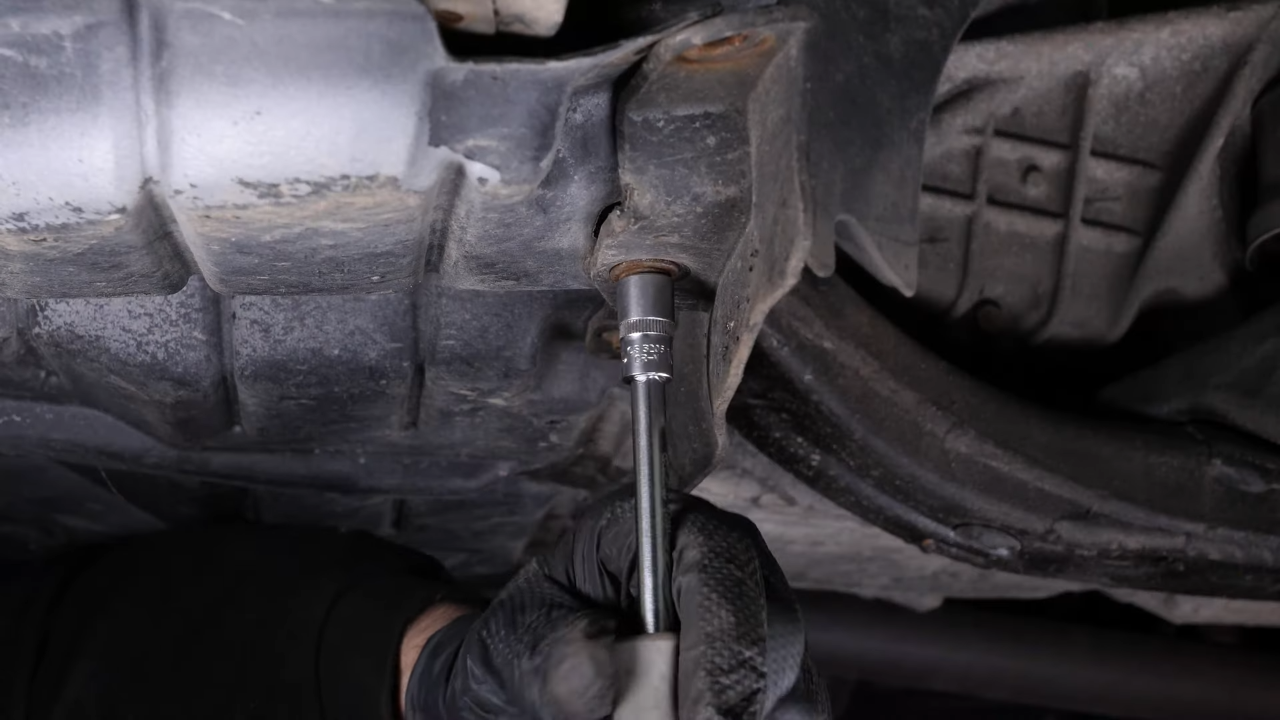 Unscrew the bottom screws