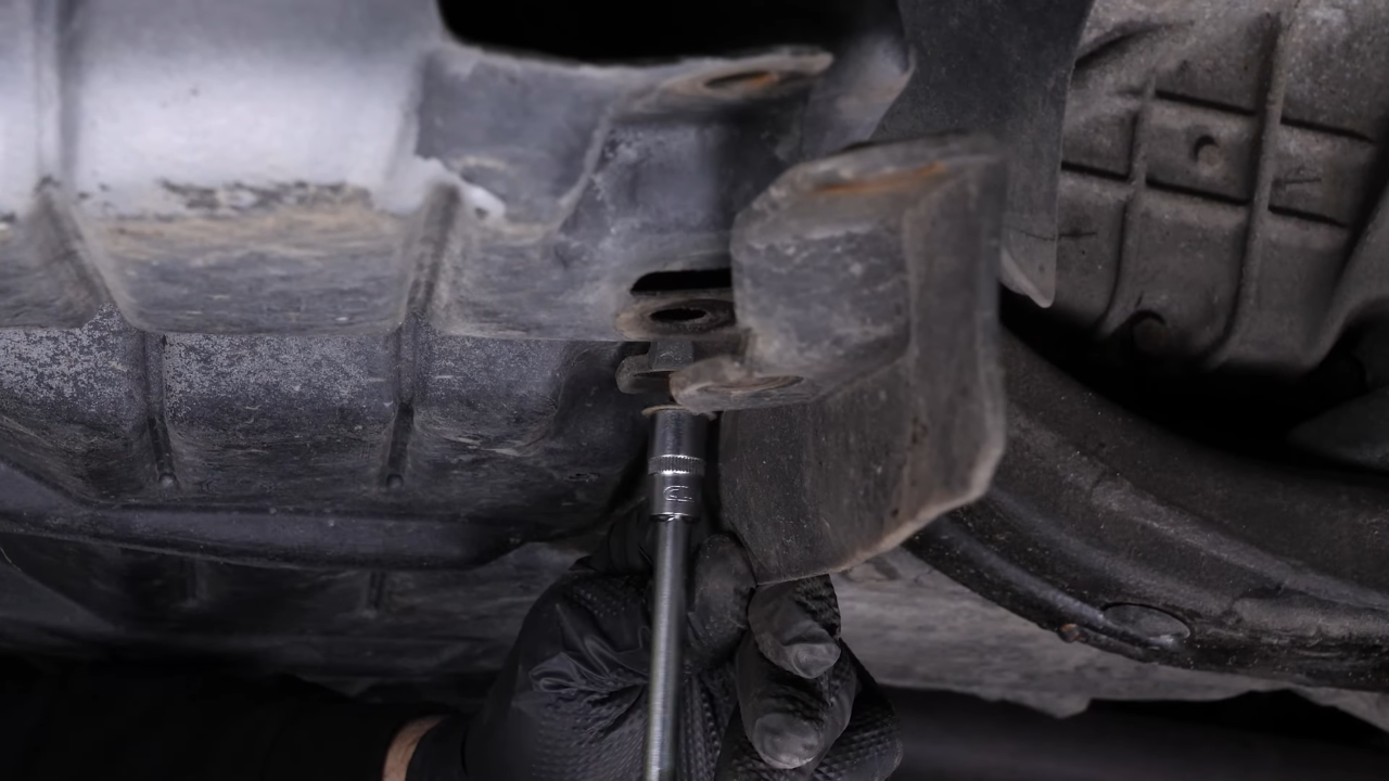 Unscrew the bottom screws
