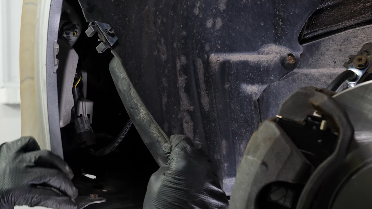 Unscrew the bottom screws