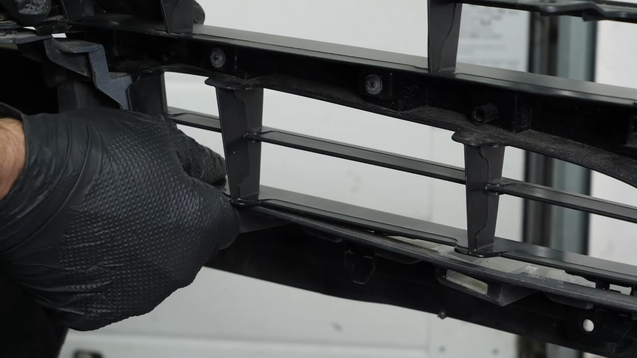 Reinstall the elements on the bumper