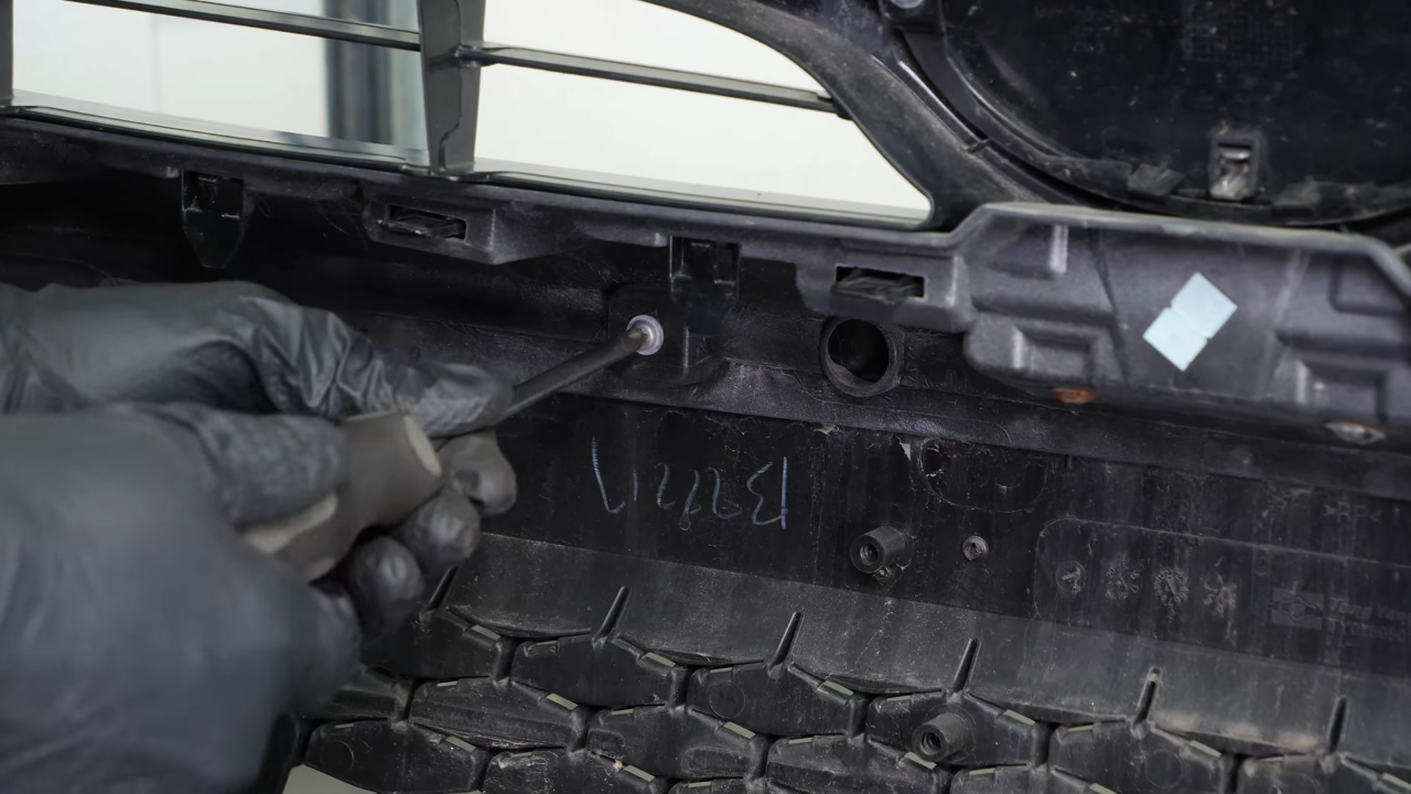 Reinstall the elements on the bumper