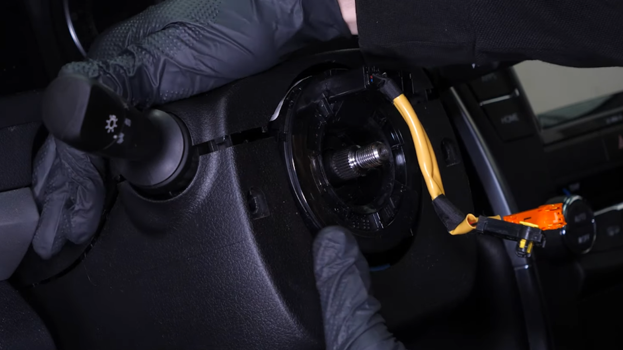 Put the turn signal switch back