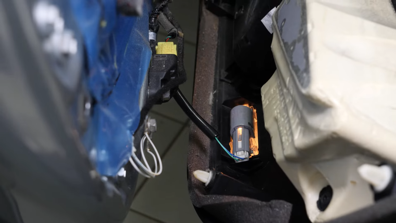 Install the new side view mirror