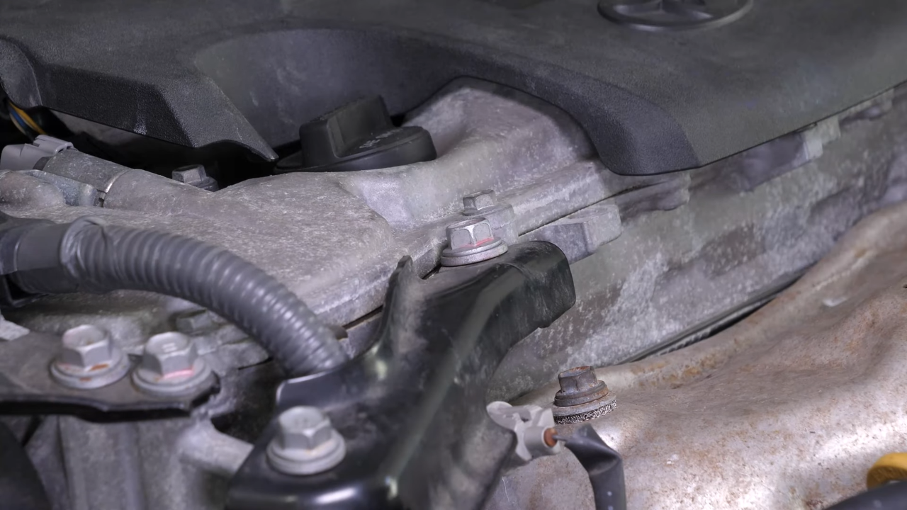 Put the metal bar back