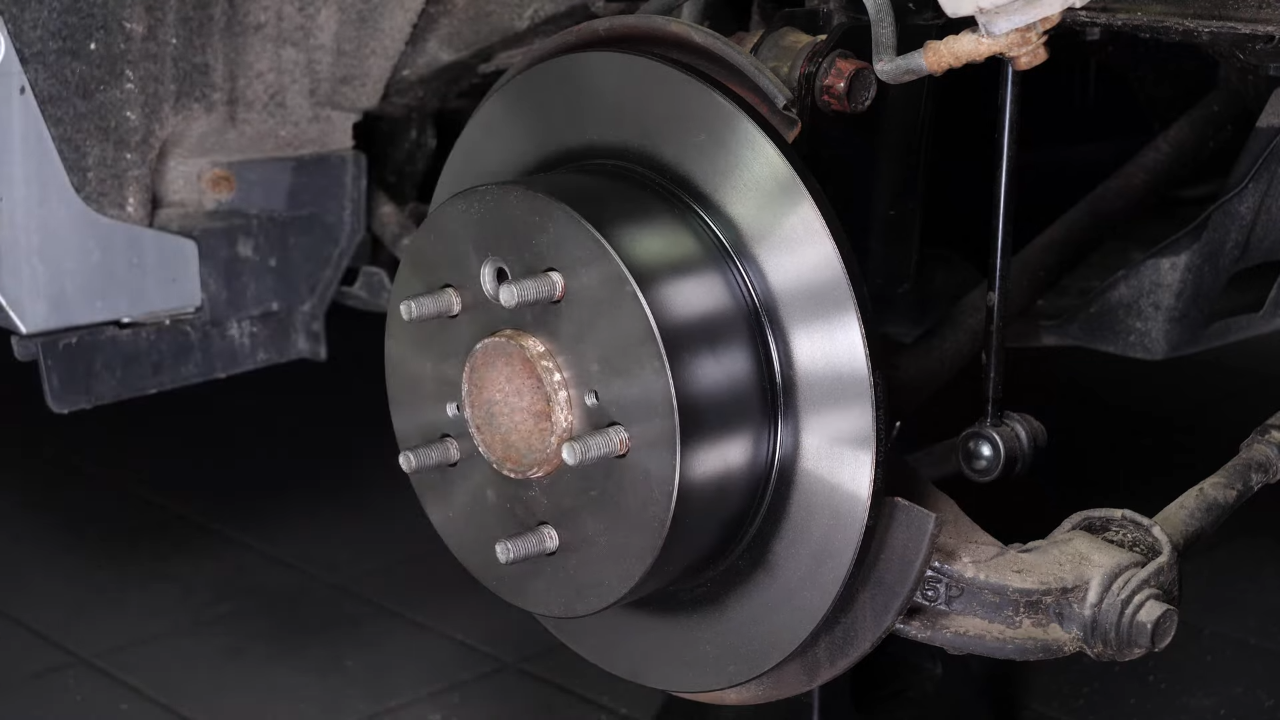 Remove the  brake caliper mount