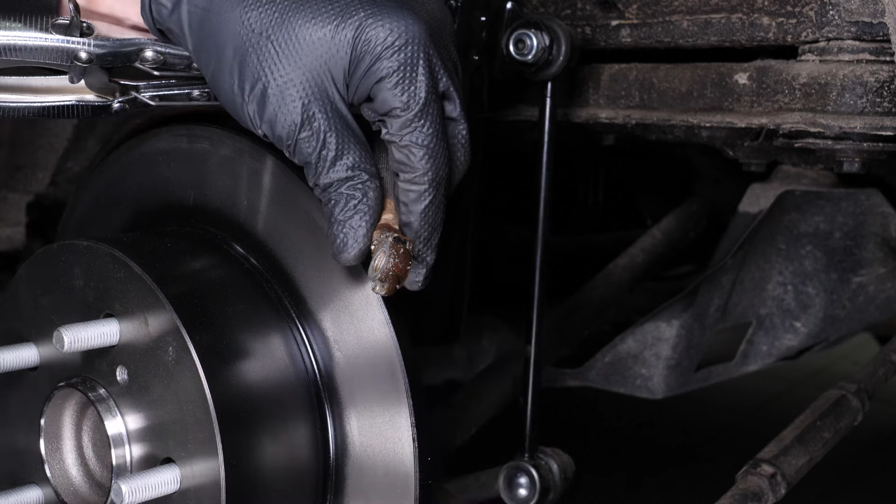 Remove the brake hose from the caliper