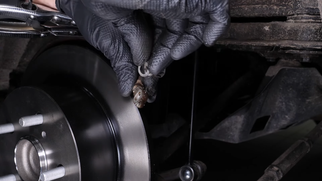 Remove the brake hose from the caliper