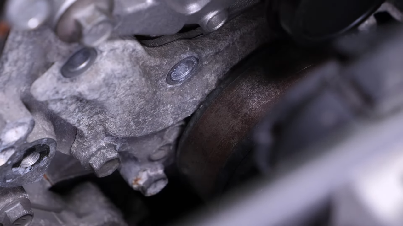 Loosen the water pump bolts